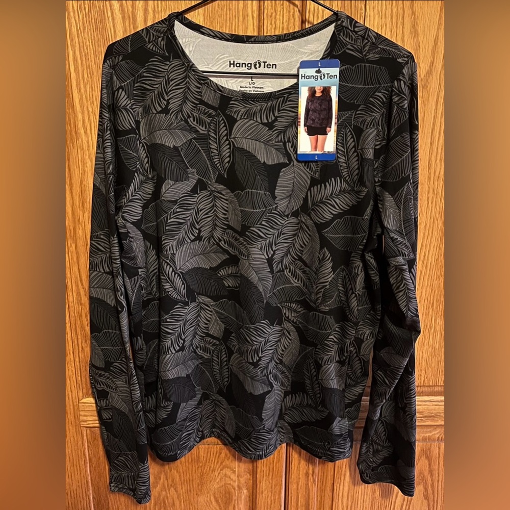 Hang Ten Women’s UV Protection Long Sleeve Sun Tee. 
Size large. New with tags.